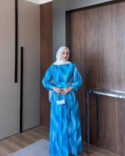 Model wearing the Safira Dress in Blue