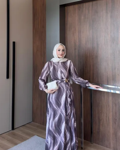 Model wearing the Safira Dress in Brown